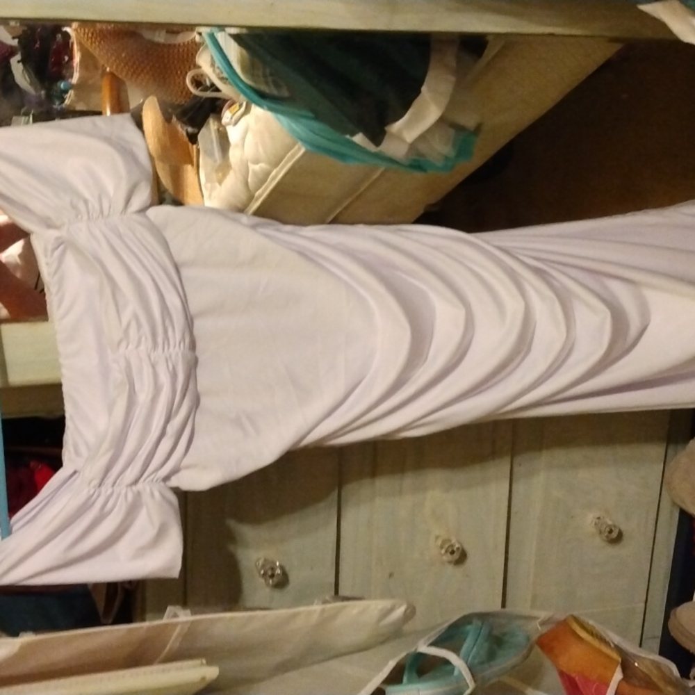 Mid calf length white dress it can be worn off the shoulder it's
